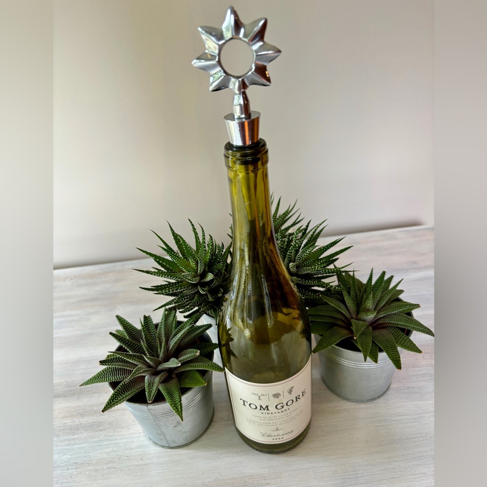 Two Silver Wine Stoppers (Star & Tear Drop Heads)
